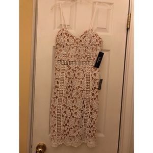 White lace mini dress 🕊